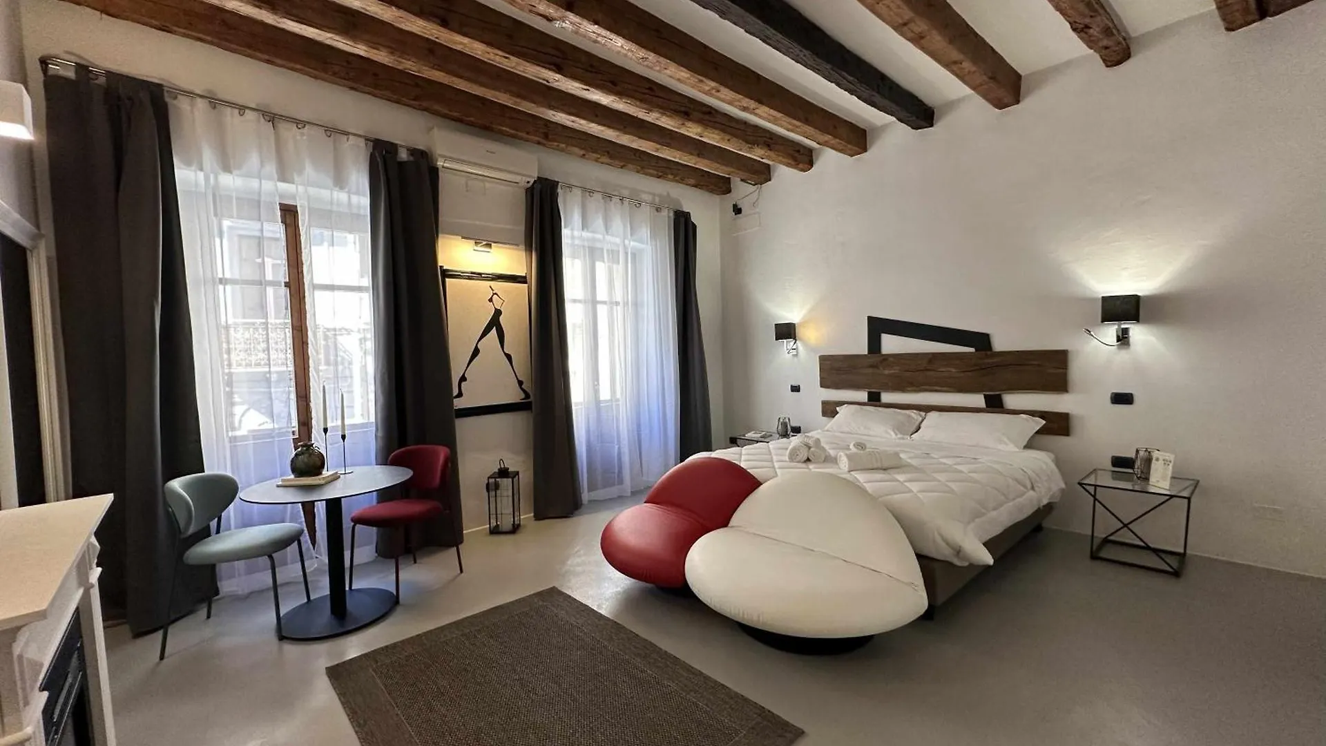 Pensión C&O Savoia Deluxe Rooms Cagliari Italia